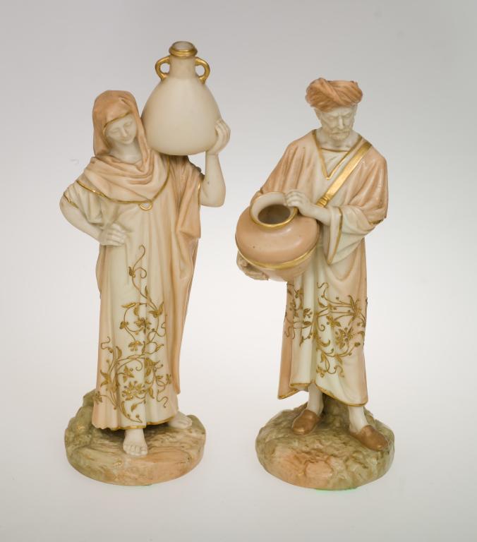 Appraisal: PAIR OF ROYAL WORCESTER BLUSH IVORY FIGURES OF CAIRO WATER