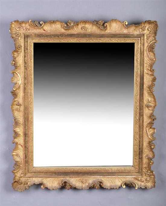 Appraisal: ROCOCO-STYLE MIRROR Rectangular with serpentine border having repeated low-relief shell