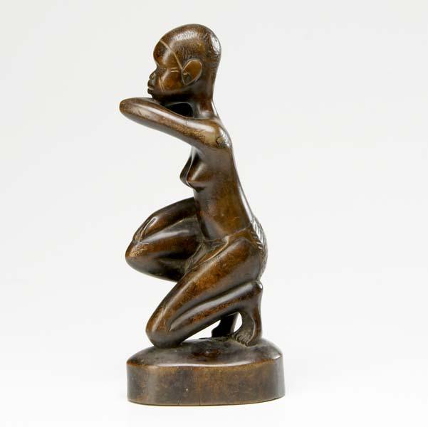 Appraisal: CARVED AFRICAN SCULPTURE Woman kneeling