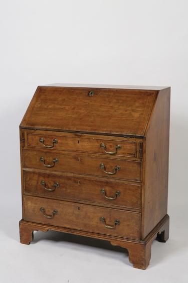 Appraisal: A GEORGE III MAHOGANY BUREAU the sloping fall enclosing a