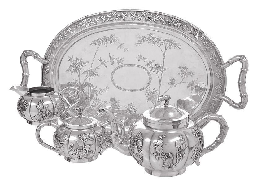 Appraisal: A CHINESE EXPORT SILVER THREE PIECE TEA SERVICE POSSIBLY KWAN