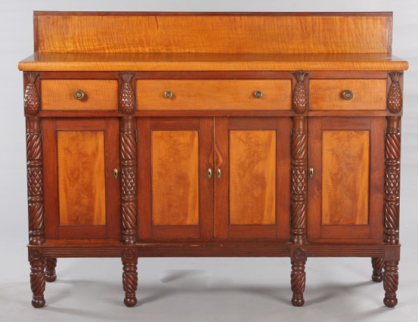 Appraisal: Three drawer over four door tiger maple and walnut case