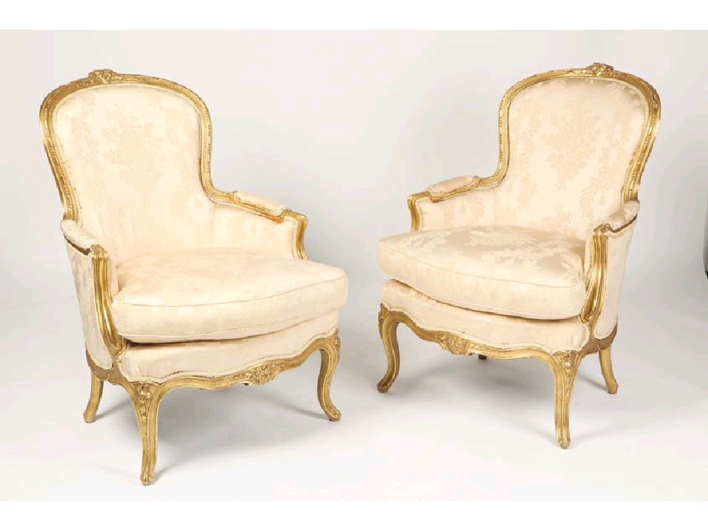 Appraisal: A PAIR OF LOUIS XV STYLE GILTWOOD BERGERES with moulded