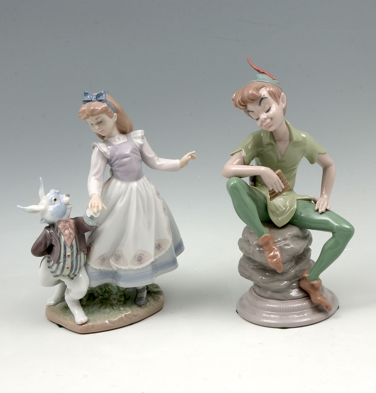 Appraisal: PC LLADRO ''PETER PAN'' ''ALICE IN WONDERLAND'' ''Alice in Wonderland''