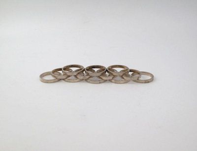 Appraisal: A set of twelve continental silver napkin rings plain circular