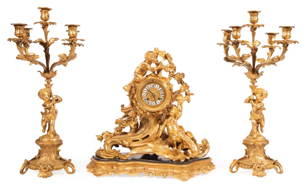 Appraisal: Napoleon III Gilt Bronze Three-Piece Clock Garniture late th c