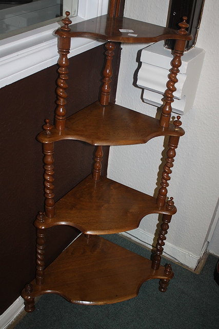 Appraisal: A WALNUT CORNER WHATNOT cm high