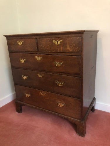 Appraisal: A George III oak chest of two short and three