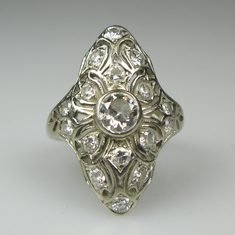 Appraisal: k White Gold Filigree Ring set with various full cut