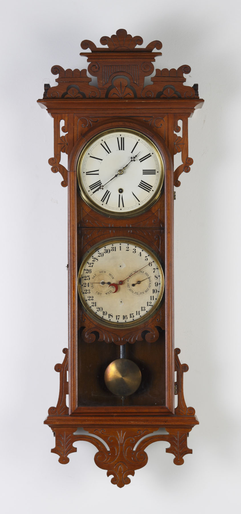 Appraisal: E N Welch Damrosch Wall Clock Walnut case with incised