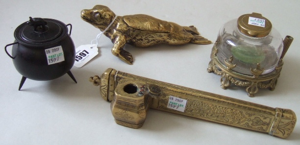 Appraisal: A brass inkwell early th century modelled as a seal