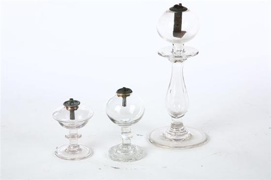 Appraisal: THREE OIL LAMPS American early th century blown glass Lace