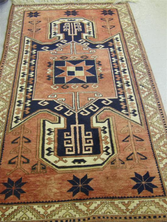 Appraisal: Persian red ground rug the main cream border and shaped