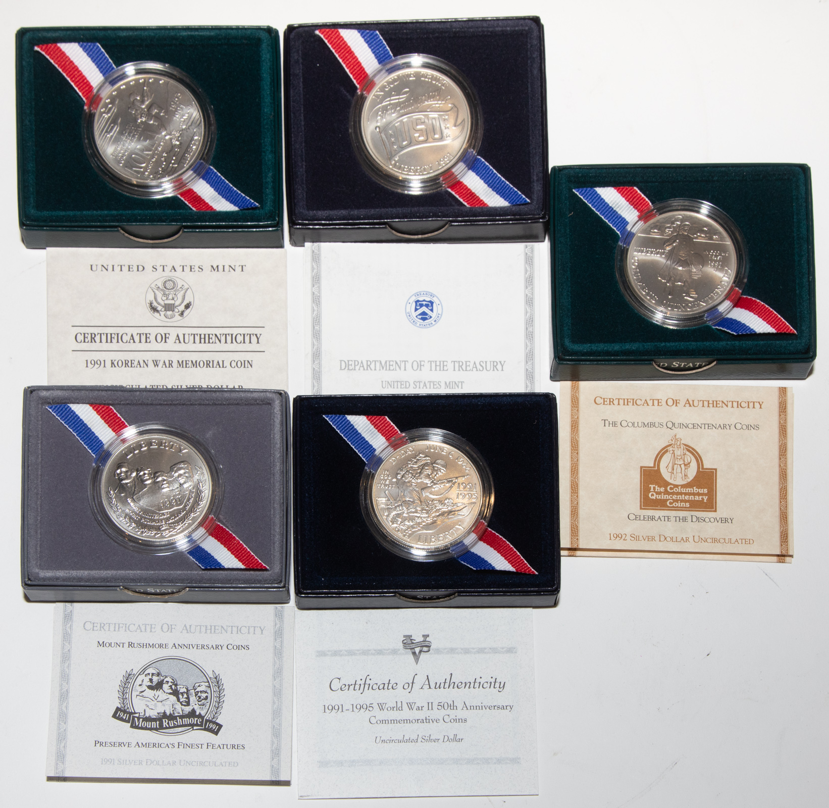 Appraisal: FIVE COMMEMORATIVE SILVER DOLLARS IN SMALL BOXES - WWII th