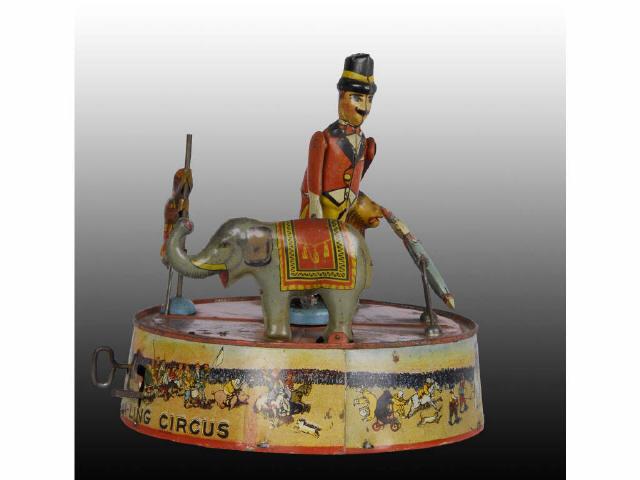 Appraisal: Marx Tin Wind-Up Ring-A-Ling Circus Toy Description Early version with