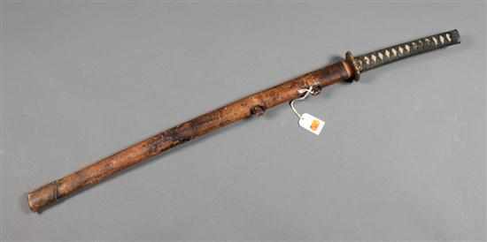 Appraisal: Japanese officer's katana sword in WWII-era leather-covered scabbard the blade