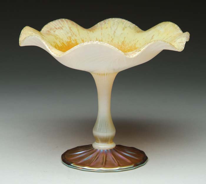 Appraisal: QUEZAL COMPOTE Outstanding Quezal compote is iridescent white on opal