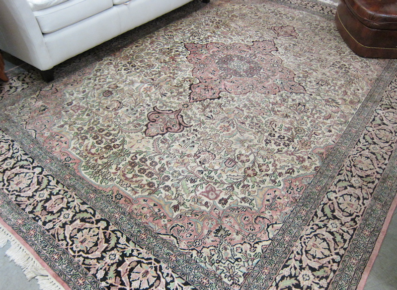 Appraisal: HAND KNOTTED ORIENTAL CARPET Indo-Persian faux silk floral and central