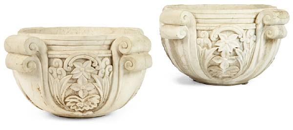 Appraisal: A pair of Neoclassical style carved marble jardini res Each