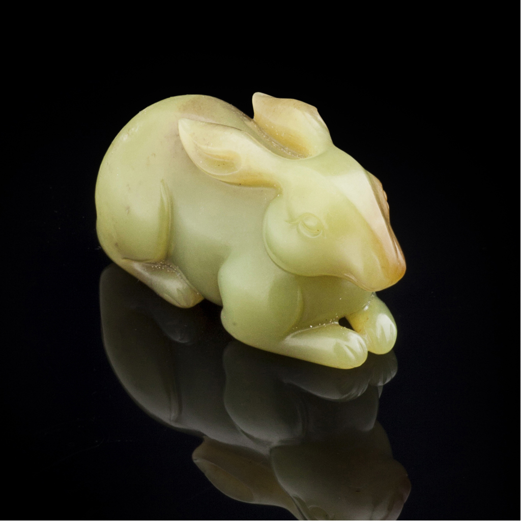 Appraisal: JADE FIGURE OF A RABBIT of naturalistic form and olive