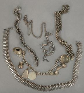 Appraisal: Silver lot with three bracelets including one with charms signed