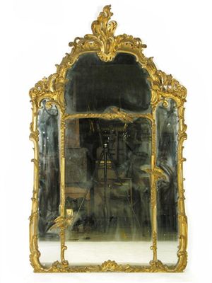 Appraisal: An early th century giltwood and gesso mantel mirror the