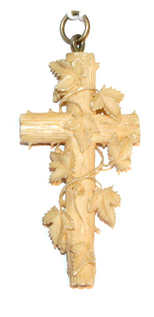 Appraisal: A VICTORIAN CARVED IVORY CROSS with vine leaf decoration long