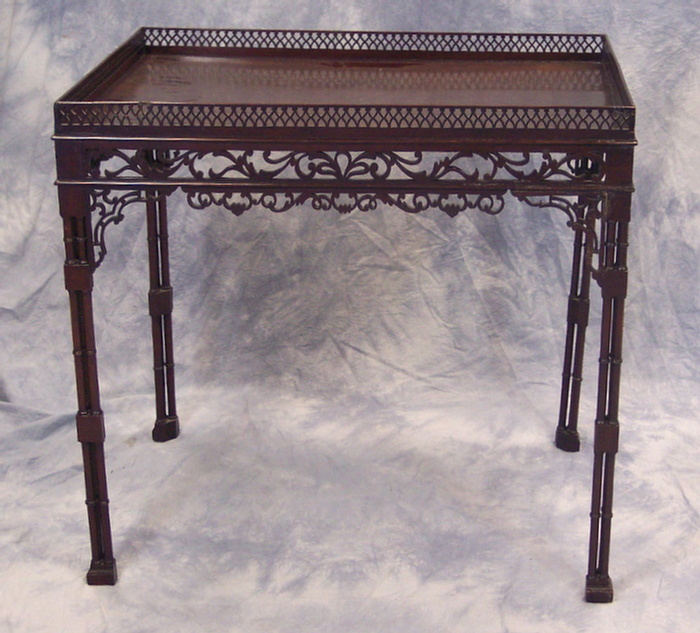 Appraisal: Georgian Chinese Chippendale tea table with pierced gallery and apron