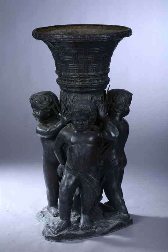 Appraisal: CONTINENTAL STYLE BRONZE PLANTER Urn top supported by three putti