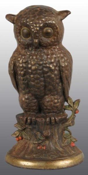 Appraisal: Cast Iron Owl on Stump Doorstop Description Made by Hubley