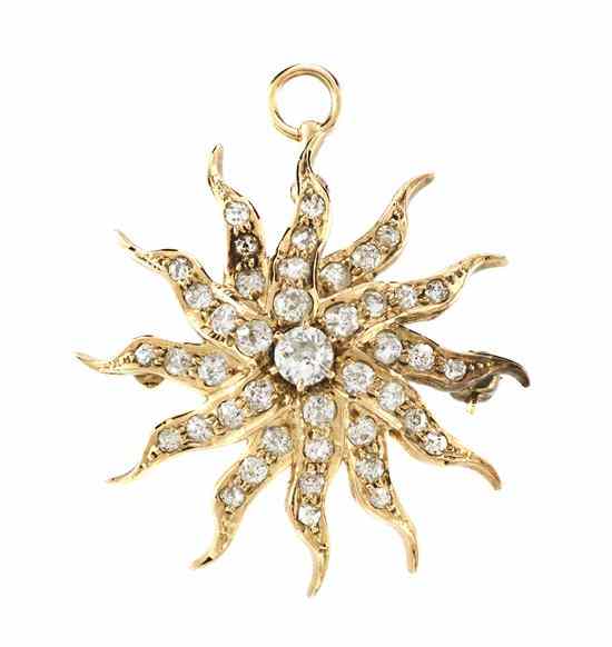 Appraisal: An Antique Yellow Gold and Diamond Starburst Pendant Brooch containing