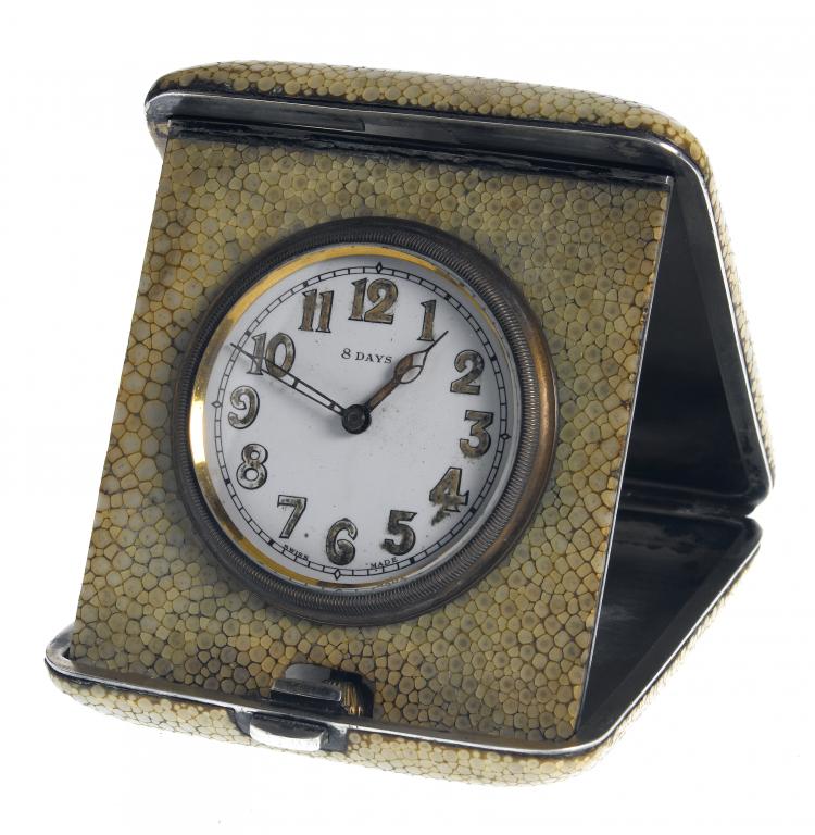 Appraisal: A GEORGE V SILVER AND SHAGREEN TRAVELLING TIMEPIECE the eight-