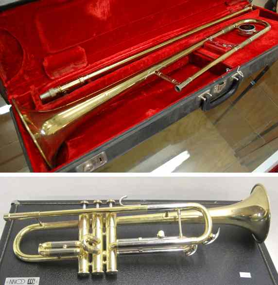 Appraisal: TWO ''BRASS'' MUSICAL INSTRUMENTS Conn trumpet brass with polished silver