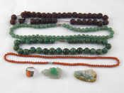 Appraisal: A mixed lot including Chinese hardstone carvings necklaces and a