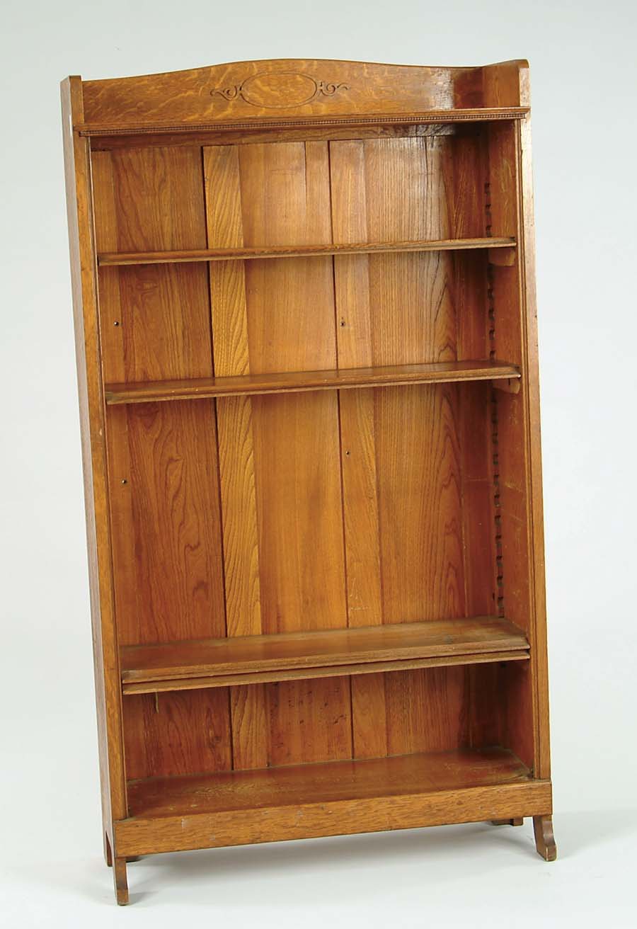 Appraisal: OAK ADJUSTABLE SHELF BOOKCASE Gallery top with applied decoration Four