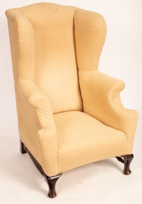 Appraisal: A Georgian style wingback armchair