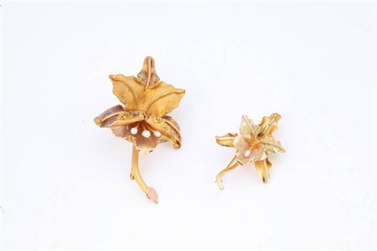 Appraisal: TWO ORCHID BROOCHES Each with pearl accents and hallmarked K