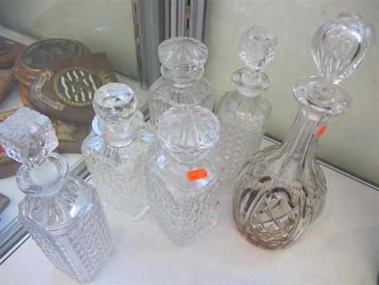 Appraisal: A GROUP OF SIX CUT CRYSTAL AND GLASS DECANTERS CHIPS