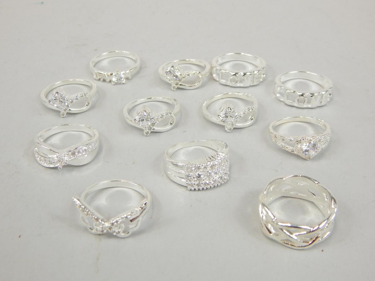 Appraisal: Twelve various dress rings of varying designs to include lattice