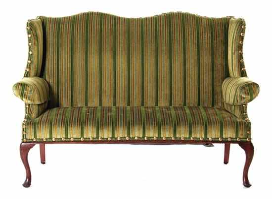 Appraisal: George III style mahogany double-back settee th century curved crest