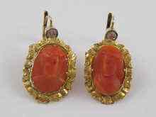 Appraisal: A pair of yellow metal tests high carat gold coral