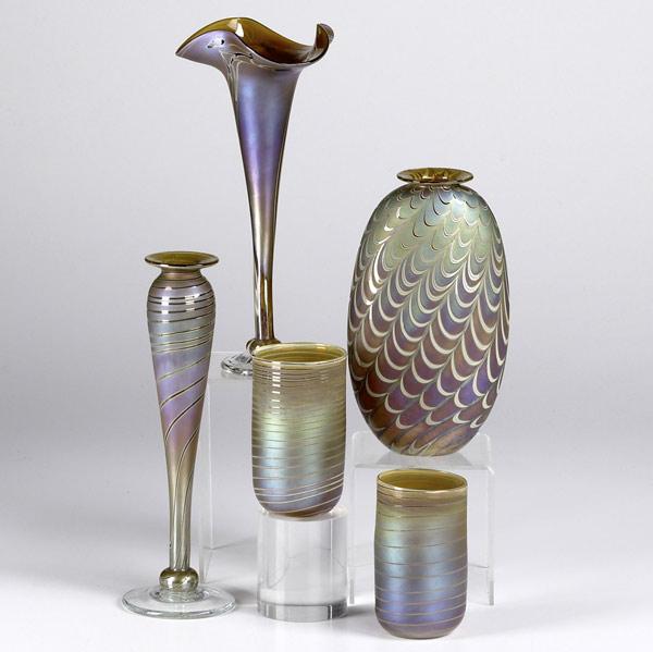 Appraisal: CRAIG ZWEIFEL Five iridescent art glass pieces include baluster shaped