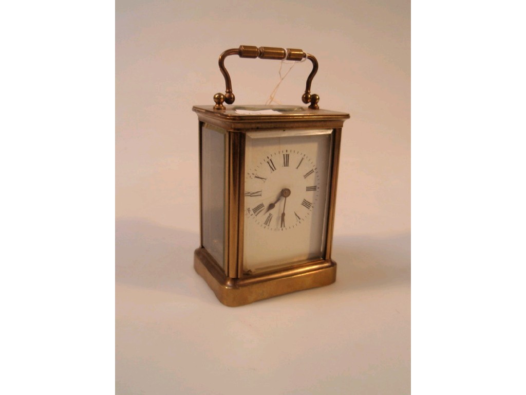 Appraisal: A gilt brass carriage timepiece cm high