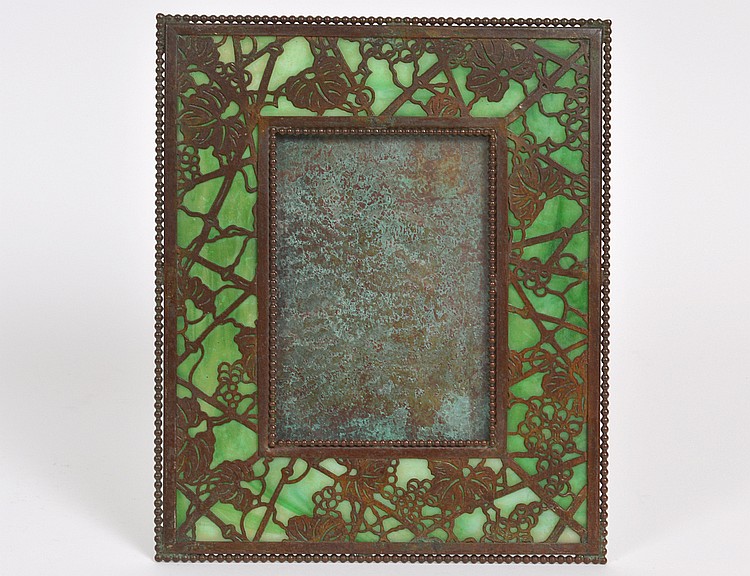 Appraisal: TIFFANY STUDIOS GLASS PATINATED BRONZE FRAMECirca The reverse of each