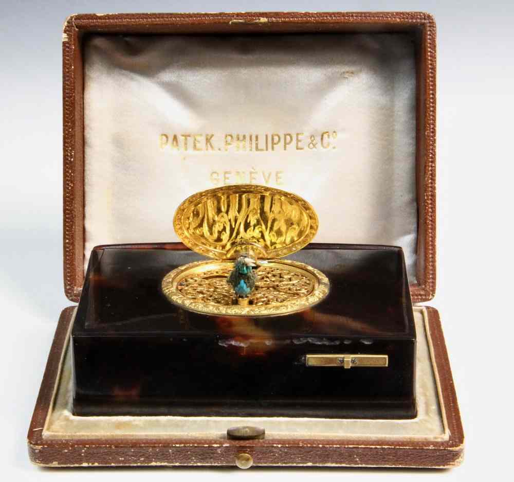 Appraisal: MINIATURE MECHANICAL MUSIC BOX - Patek Philippe Miniature Tortoise Shell