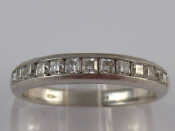 Appraisal: Tiffany Co A platinum and diamond Lucida half eternity ring