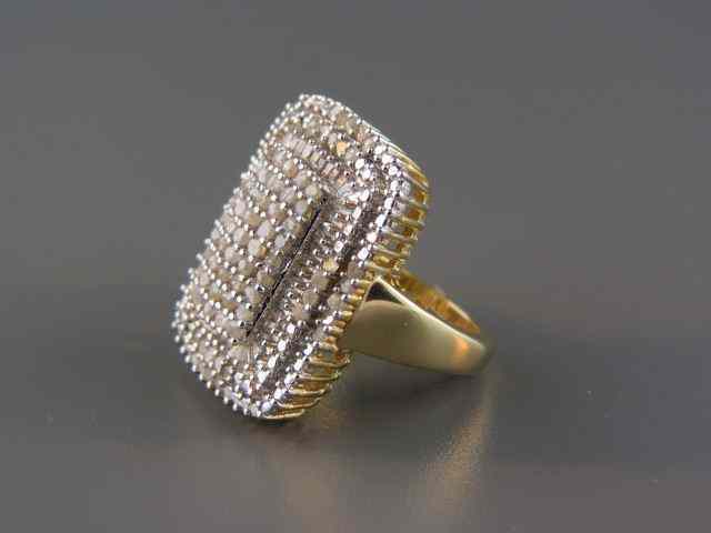 Appraisal: Diamond Ring round baguette diamonds totaling approx carats in gold