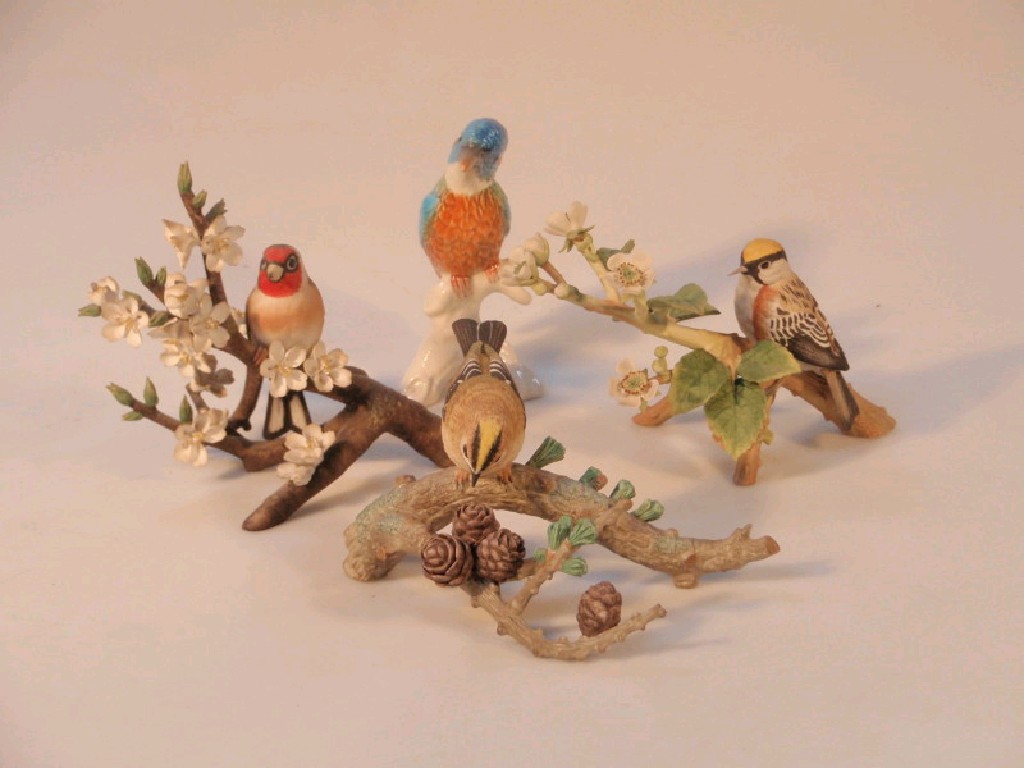 Appraisal: A Goebel figure of a Kingfisher and three Franklin porcelain