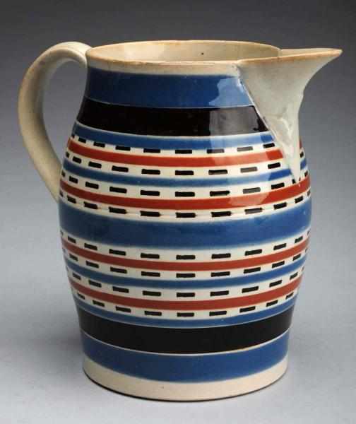 Appraisal: Early th Century Mochaware Pitcher English Geometric design decorates the