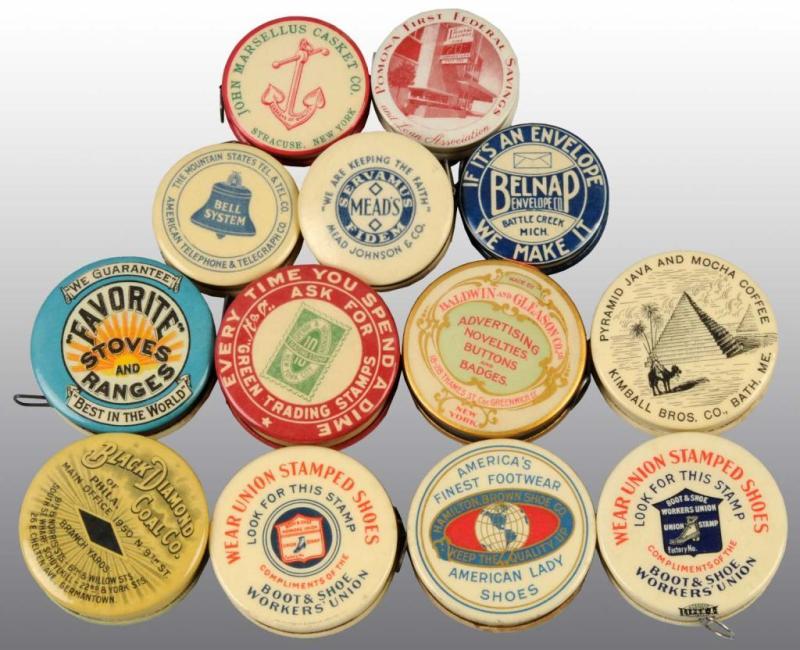 Appraisal: Lot of Celluloid Advertising Tape Measures Description Includes Favorite's Stoves